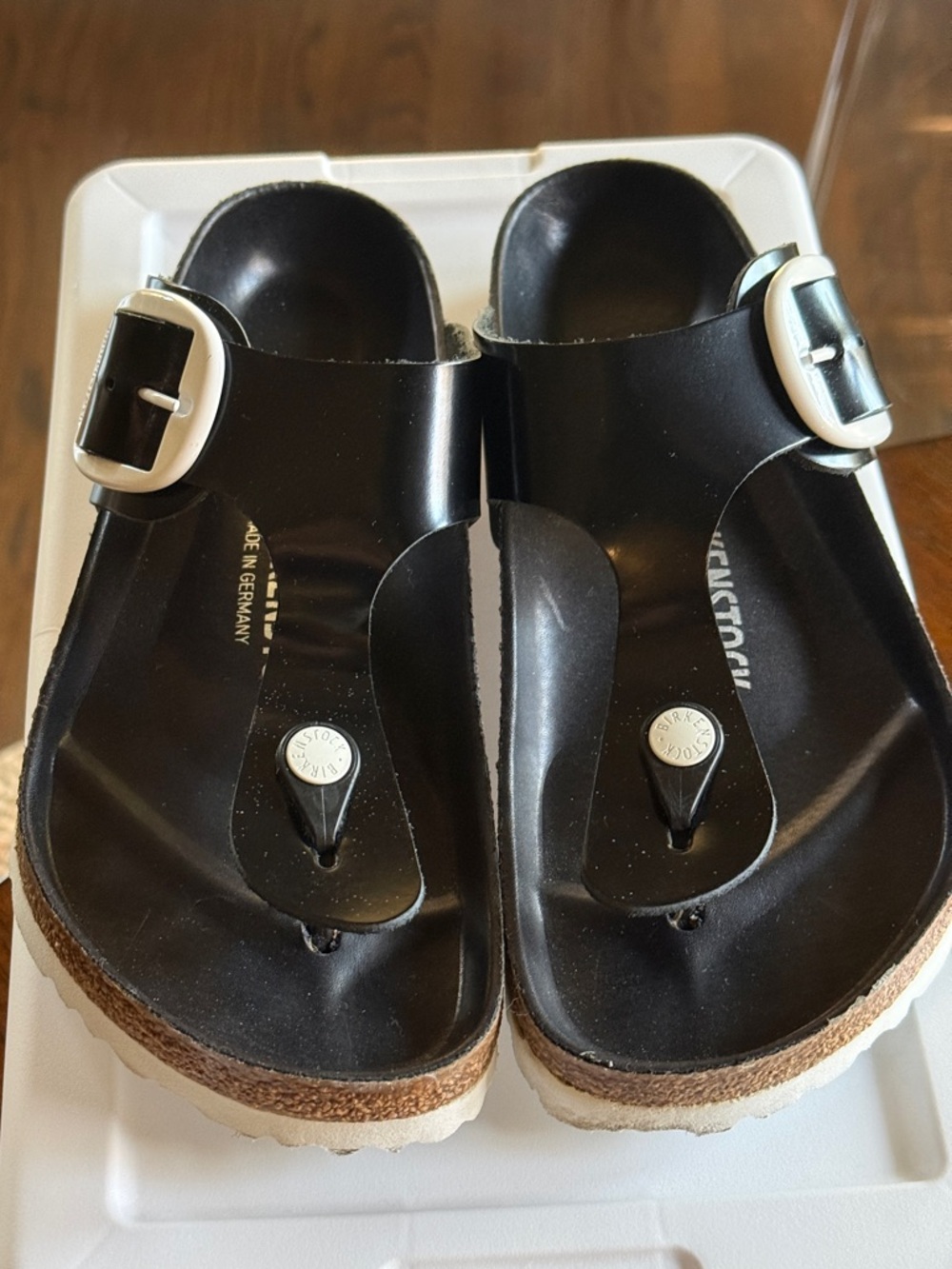 Birkenstock Black Thong Sandals with White Sole and White Buckle